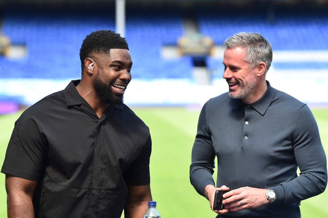 Former players and Sky Sports presenters Micah Richards (L) and Jamie Carragher laugh before the start of the English Premier League football match...