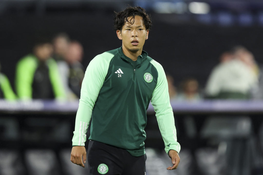 Tomoki Iwata of Celtic FC warms up prior to the UEFA Champions League match between Feyenoord and Celtic FC at Feyenoord Stadium on September 19, 2...