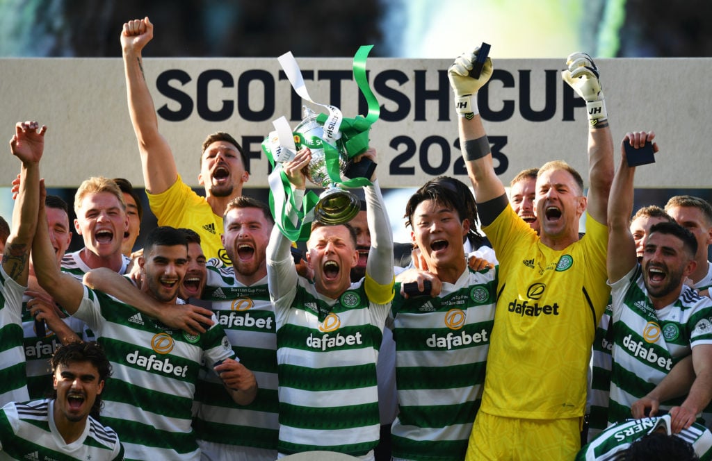 Callum McGregor of Celtic lifts the Scottish Cup trophy after the team's victory during the Scottish Cup Final between Celtic and Inverness Caledon...