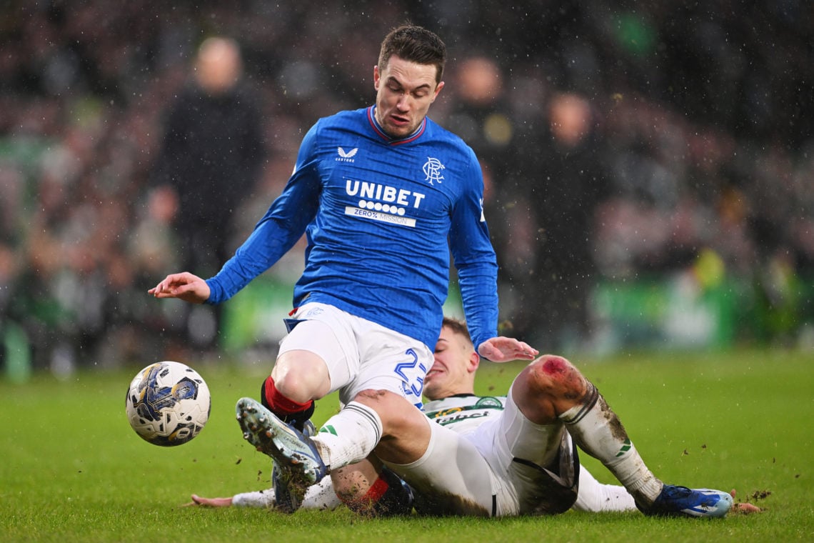 Scott Wright of Rangers is tackled by Maik Nawrocki of Celtic during the Cinch Scottish Premiership match between Celtic FC and Rangers FC at Celti...