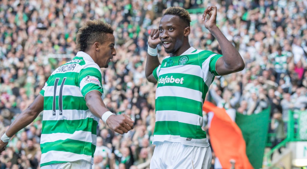 Moussa Dembele of Celtic celebrates his 2nd goal with Scott Sinclair during the Ladbrokes Scottish Premiership match between Celtic and Rangers at ...
