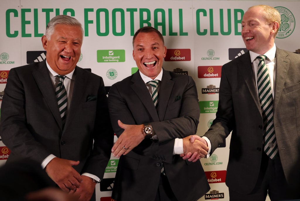 Peter Lawwell, Brendan Rodgers and Michael Nicholson are seen as New Celtic manager Brendan Rodgers attends a press conference at Celtic Park on Ju...