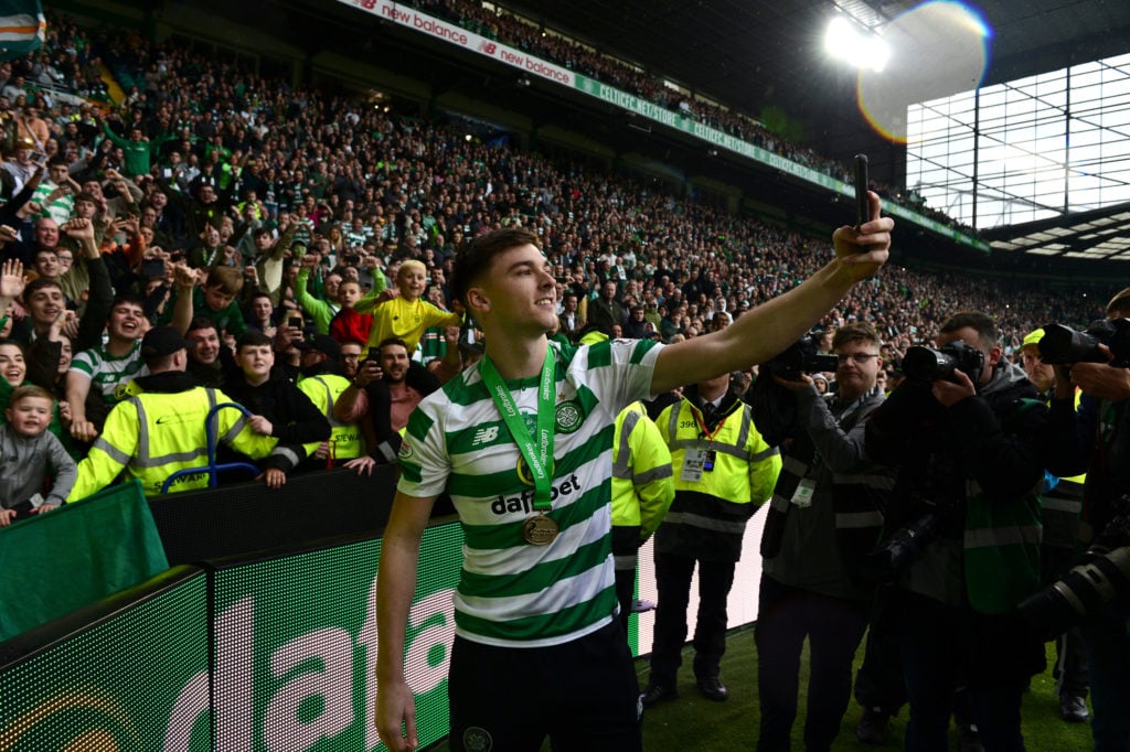 Kieran Tierney of Celtic takes a selfie with the Celtic fans after the Ladbrokes Scottish Premiership match between Celtic FC and Heart of Midlothian FC at Celtic Park