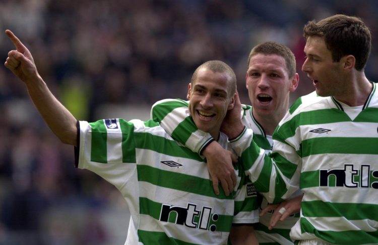 15 Apr 2001: Henrik Larsson (left) celebrates with team mates Alan Thompson (centre) and Chris Sutton after giving Celtic a two-nil lead during the...