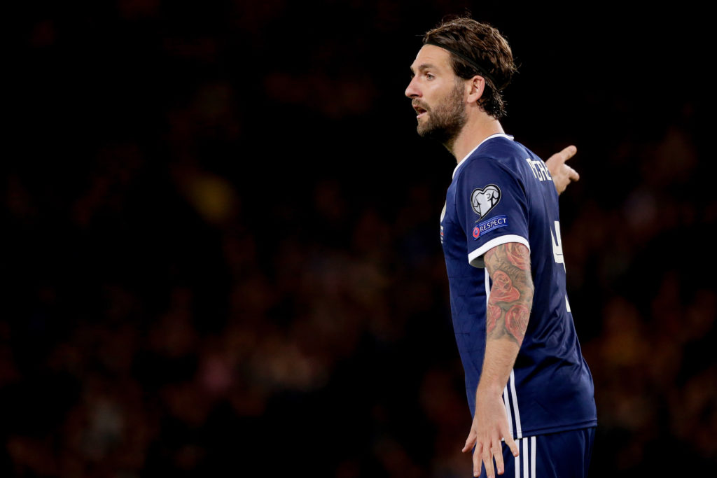 Charlie Mulgrew in action for Scotland against Russia.