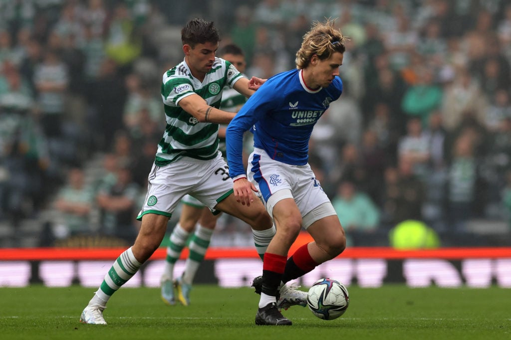 Matt O'Riley of Celtic vies with Todd Cantwell of Rangers during the Scottish Cup Semi Final match between Rangers and Celtic at Hampden Park on Ap...