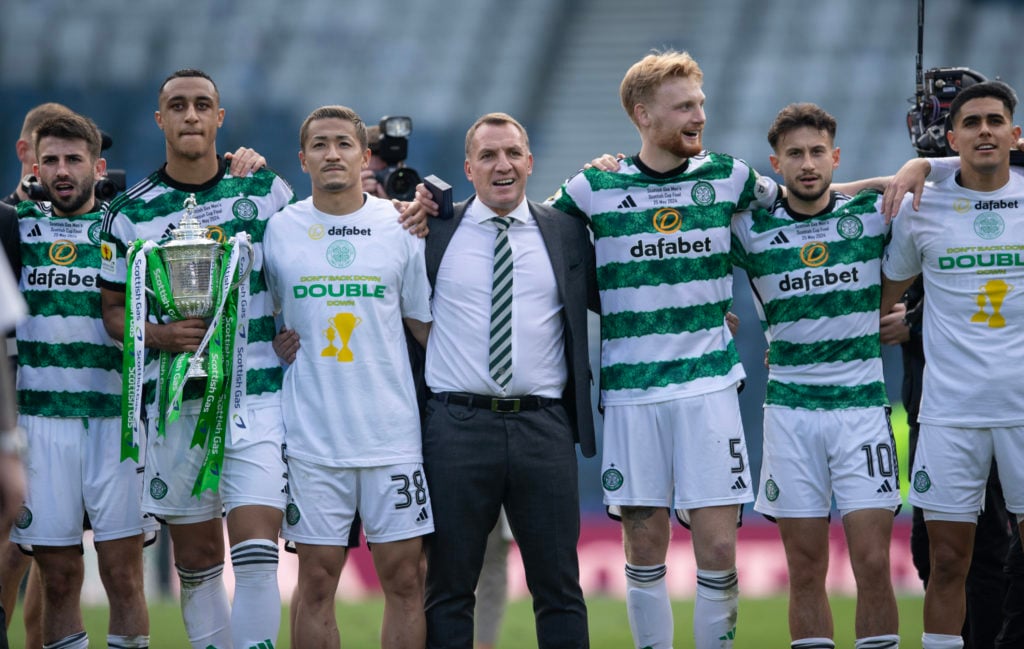 Greg Taylor, Adam Idah, Daizen Maeda, Brendan Rodgers, Liam Scales, Nicolas Kuhn and Luis Palma of Glasgow Celtic FC sing ' You'll Never Walk Alone...