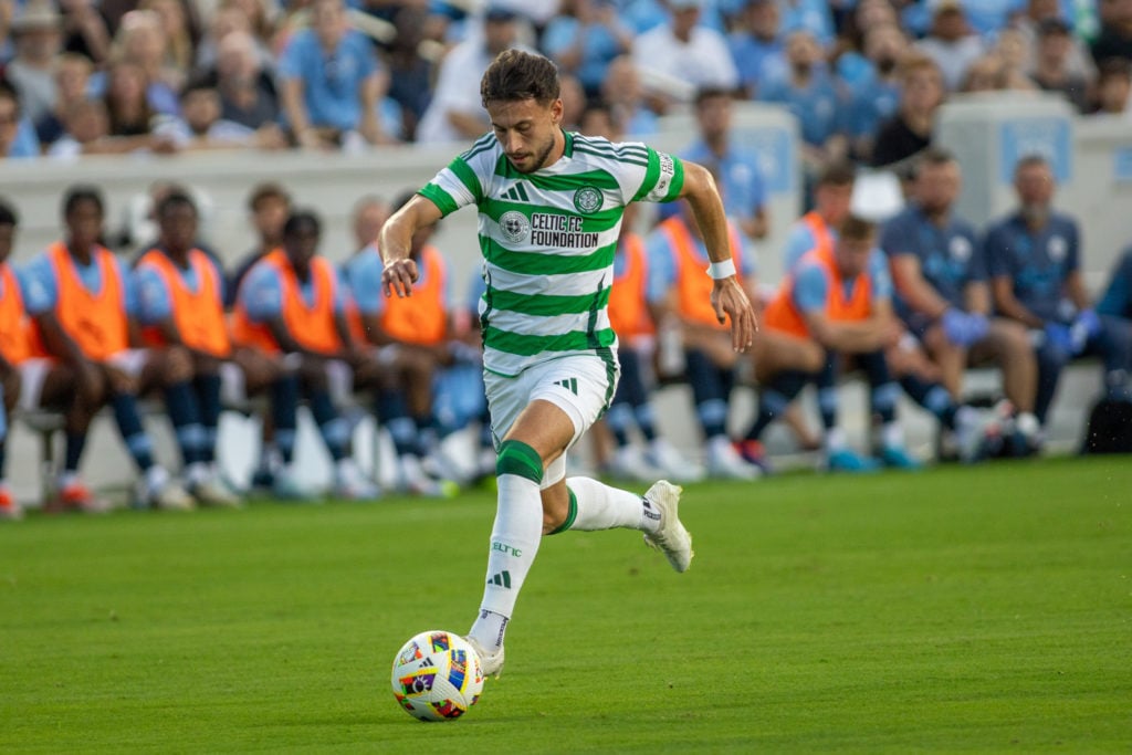 Nicolas-Gerrit Kühn #10 of Celtic pushes forward during a match between Manchester City and Celtic at Kenan Stadium on July 23, 2024 in Chapel Hill...