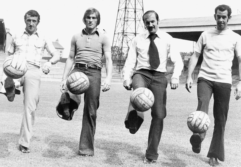 Kenny Dalglish posing with a ball as a Celtic player.