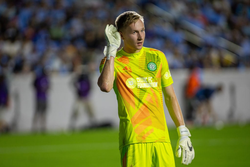 Viljami Sinisalo #12 of Celtic hears out instructions from his teammates during a match between Manchester City and Celtic at Kenan Stadium on July...