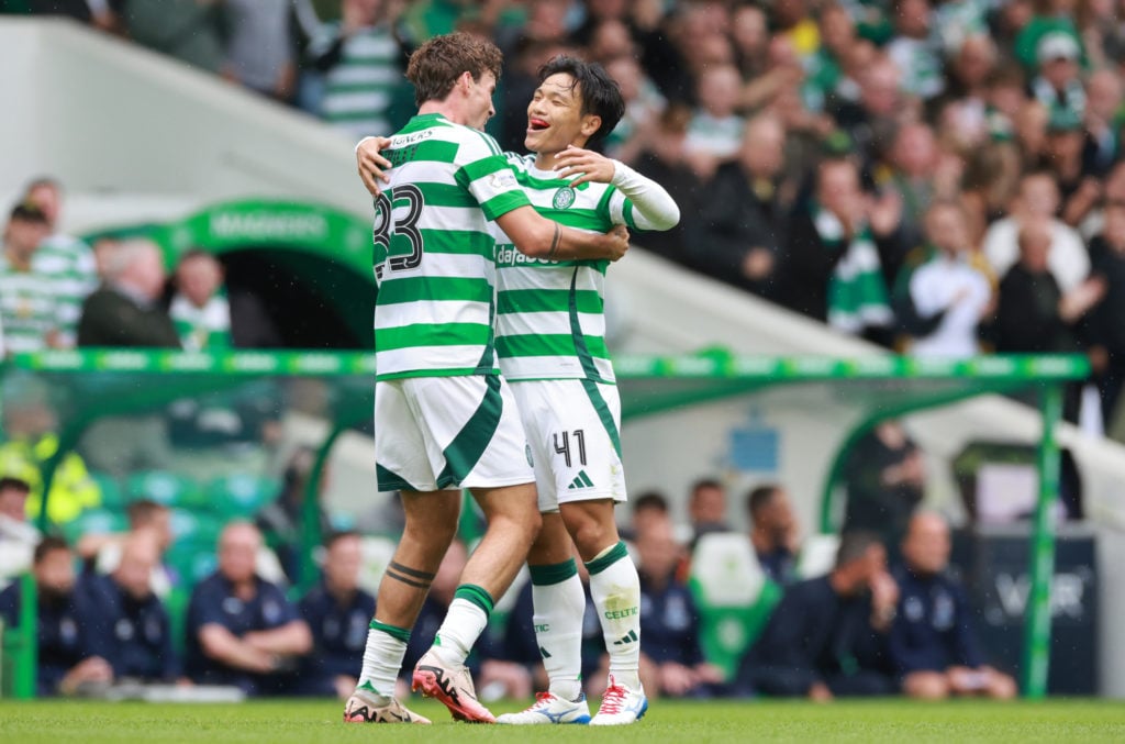 Celtic's Reo Hatate celebrates his goal with Matt O'Riley during the cinch Premiership match between Celtic FC and Kilmarnock FC at Celtic Park on ...