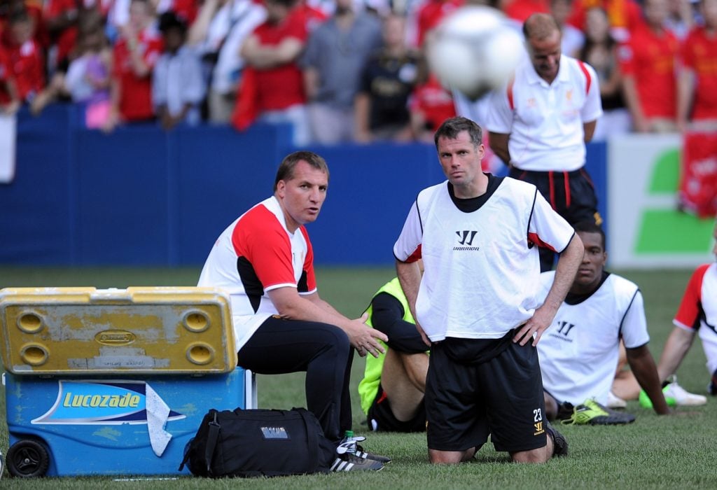 (THE SUN OUT, THE SUN ON SUNDAY OUT) Manager Brendan Rodgers of Liverpool FC talks with Jamie Carragher during a training session in the Rogers Ce...