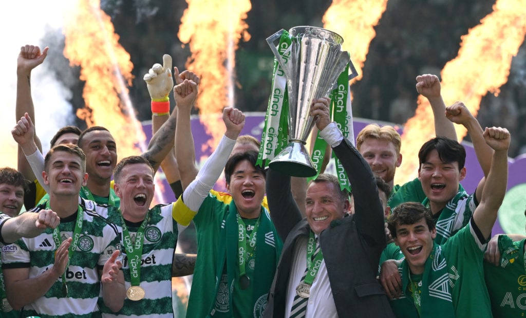 Celtic manager Brendan Rodgers holds aloft the league winners trophy after the Cinch Scottish Premiership match between Celtic FC v St Mirren at Ce...