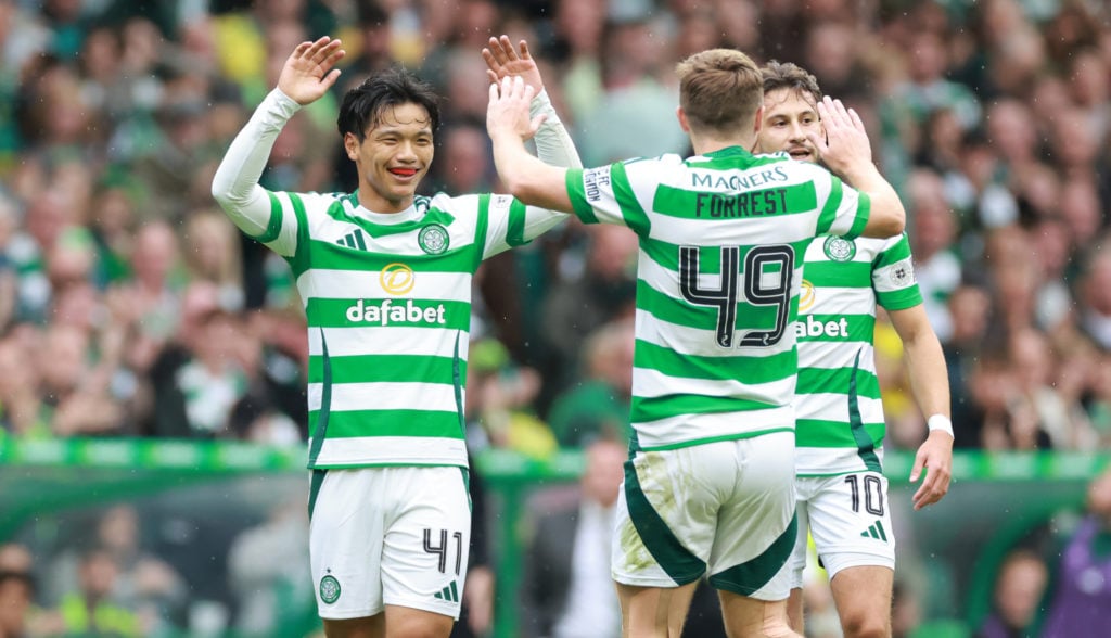 Celtic's Reo Hatate celebrates his goal with teammate James Forrest  during the cinch Premiership match between Celtic FC and Kilmarnock FC at Celt...