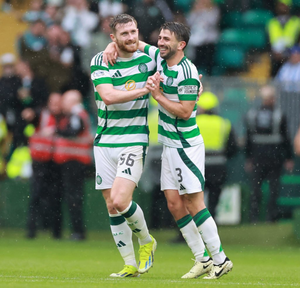 Anthony Ralston celebrates his teams 4th goal with teammate Greg Taylor during the cinch Premiership match between Celtic FC and Kilmarnock FC at C...