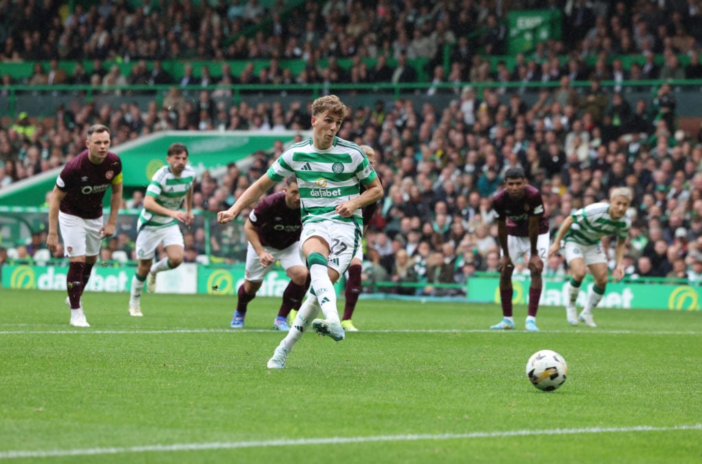 Arne Engels of Celtic scores his team's opening goal for the penalty spot during the SPL | Premier League match between Celtic FC and Heart of Midl...