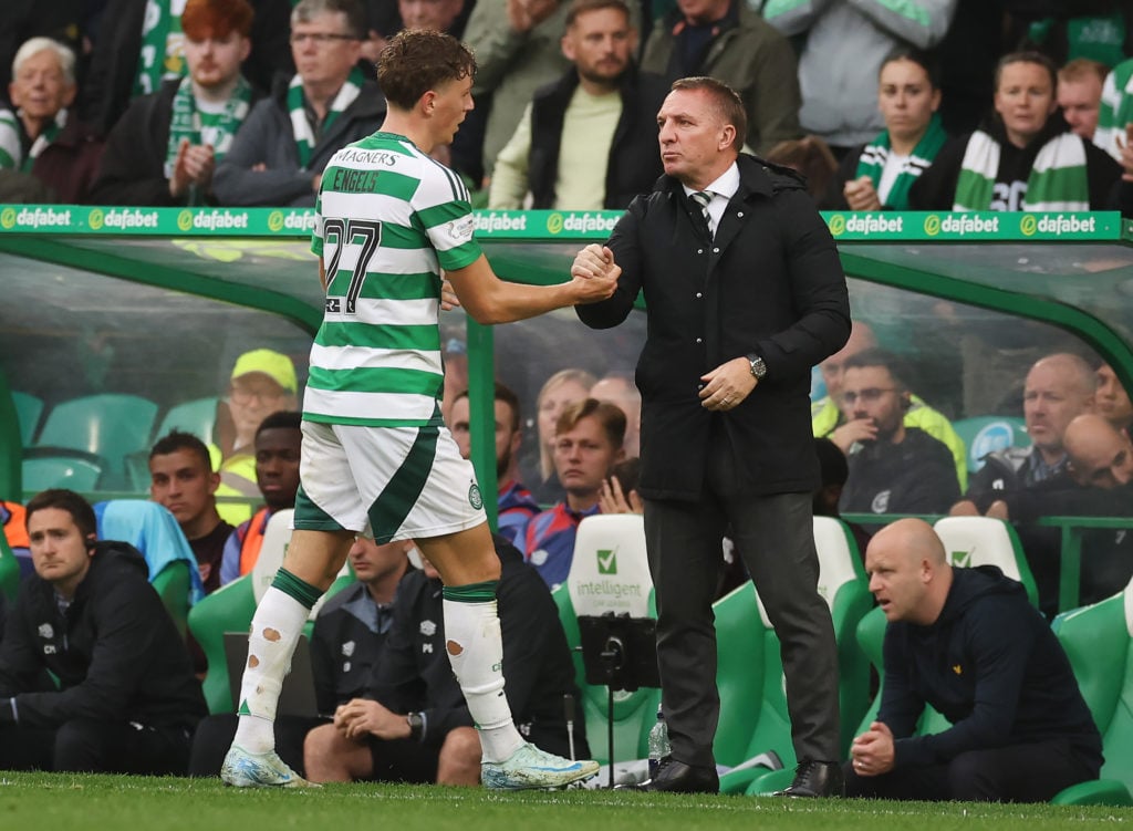 Arne Engels of Celtic reacts with his manager Brendan Rodgers after he is substituted during the SPL | Premier League match between Celtic FC and H...