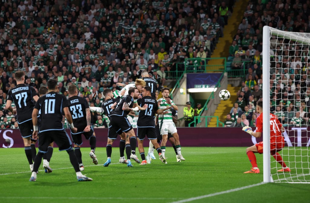 Liam Scales of Celtic scores his team's first goal during the UEFA Champions League 2024/25 League Phase MD1 match between Celtic FC and SK Slovan ...