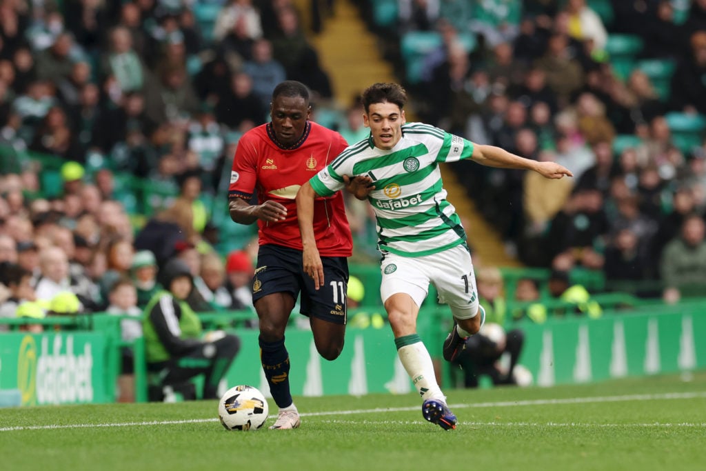 Alex Valle of Celtic is challenged by Alfie Agyeman of Falkirk FC during the Premier Sports Cup Quarter Final between Celtic and Falkirk at Celtic ...