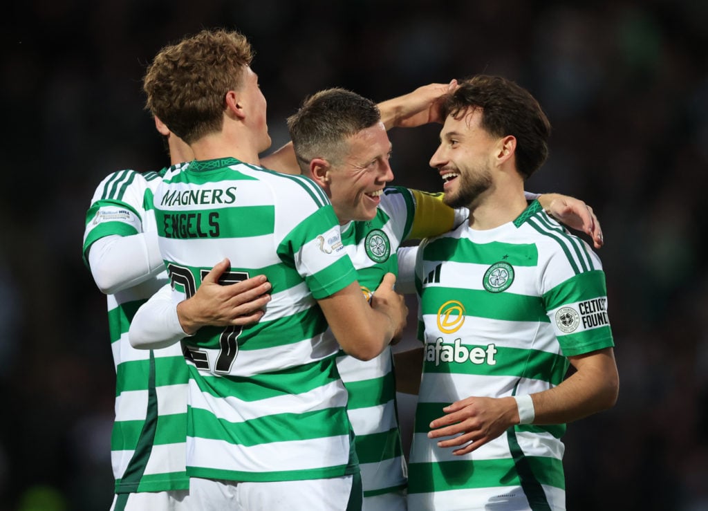 Celtic captain Callum McGregor celebrates after scoring his team's fourth goal during the SPL | Premier League match between St. Johnstone FC and C...