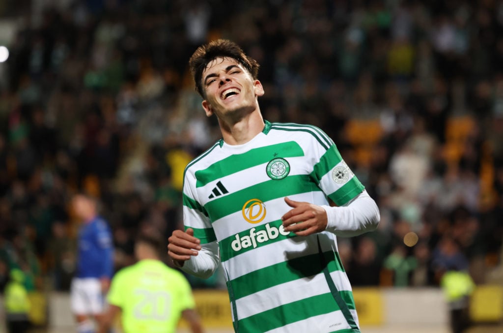 Alex Valle of Celtic celebrates after providing an assist for Adam Idah of Celtic to score his team's sixth goal during the SPL | Premier League ma...