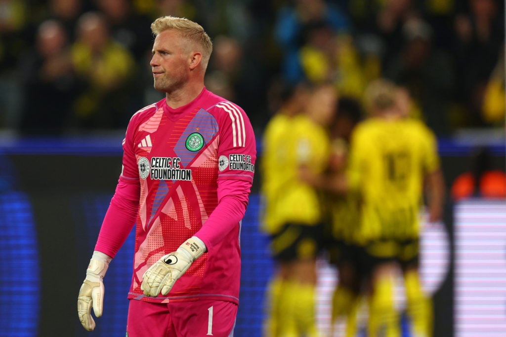 Kasper Schmeichel of Celtic reacts after Karim Adeyemi of Borussia Dortmund (not pictured) scores his team's third goal during the UEFA Champions L...