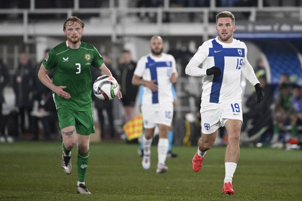 Ireland's defender #03 Liam Scales (L) and Finland's forward #19 Benjamin Kallman (R) vie for the ball during the UEFA Nations League League B Grou...