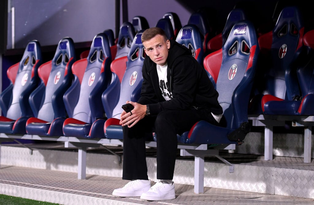 Lewis Ferguson of Bologna looks on from the substitutes bench prior to the Serie A match between Bologna and Atalanta at Stadio Renato Dall'Ara on ...