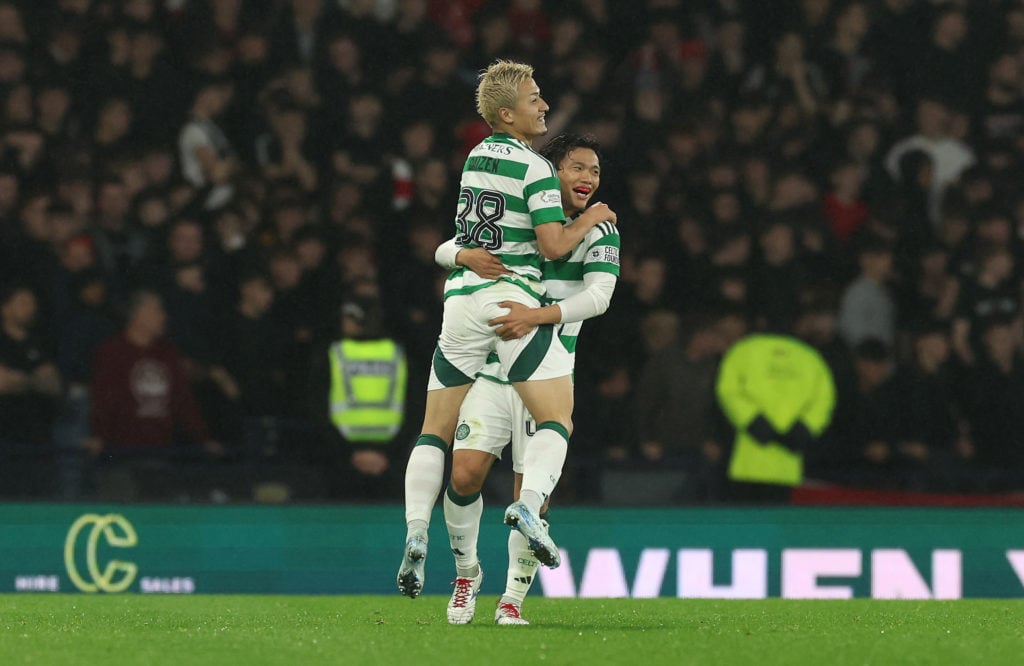 Kyogo Furuhashi of Celtic celebrates scoring his team's second goal with teammate Daizen Maeda during the Premier Sports Cup Semi-Final match betwe...