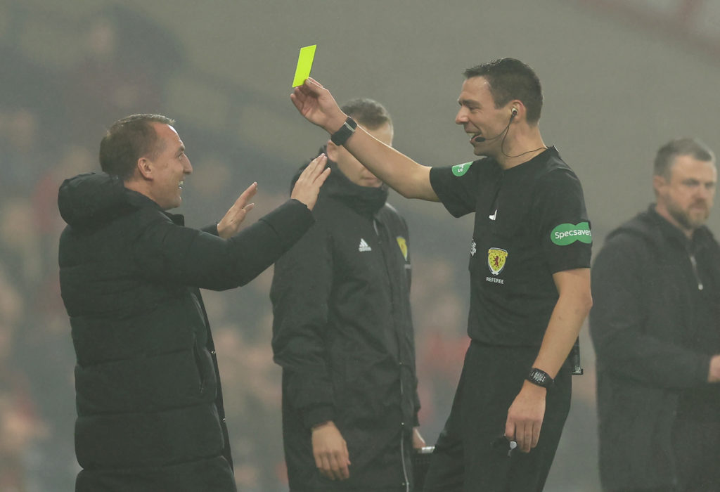 Brendan Rodgers, Manager of Celtic, receives a yellow card from referee Kevin Clancy during the Premier Sports Cup Semi-Final match between Celtic and Aberdeen at Hampden Park