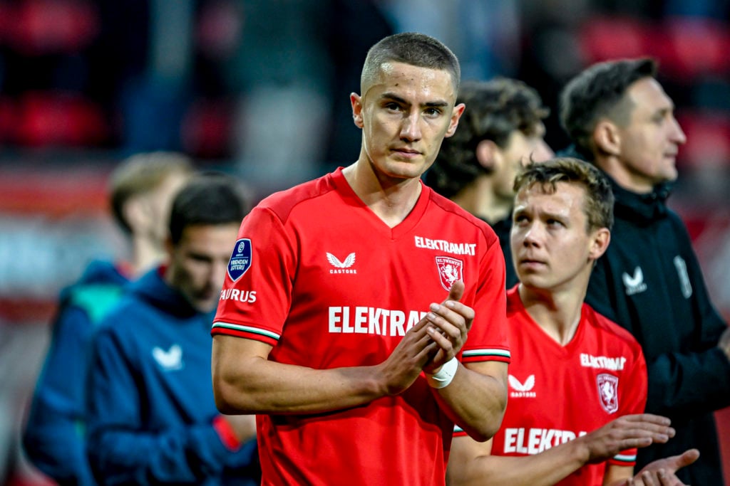 FC Twente defender Gustaf Lagerbielke claps after the match between Twente and Ajax at the Grolsch Veste stadium
