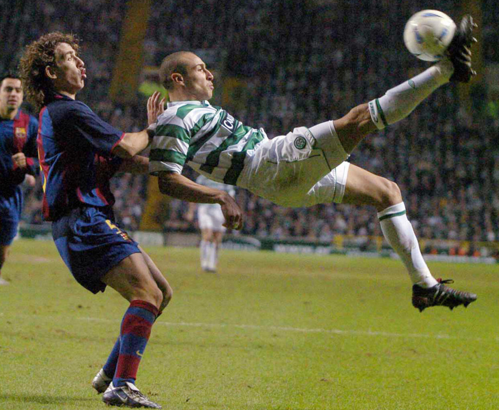Barcelona's Puyol (L) looks on as Celtic