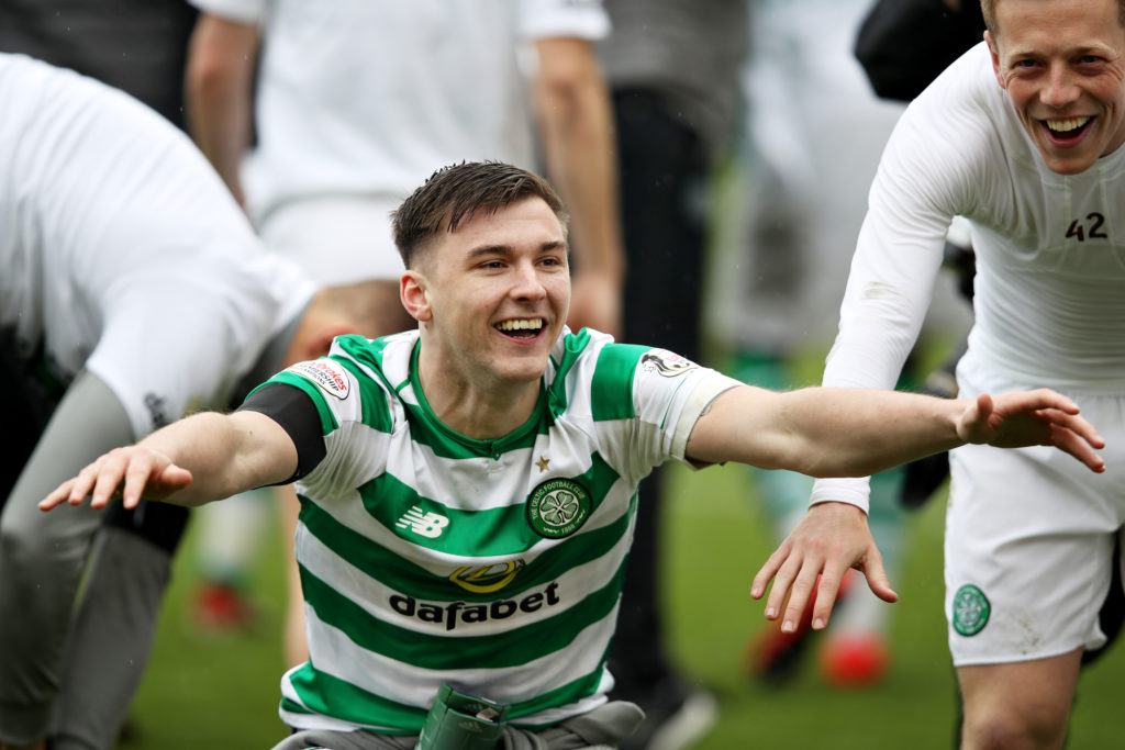 Kieran Tierney celebrates the Premiership title with Celtic.