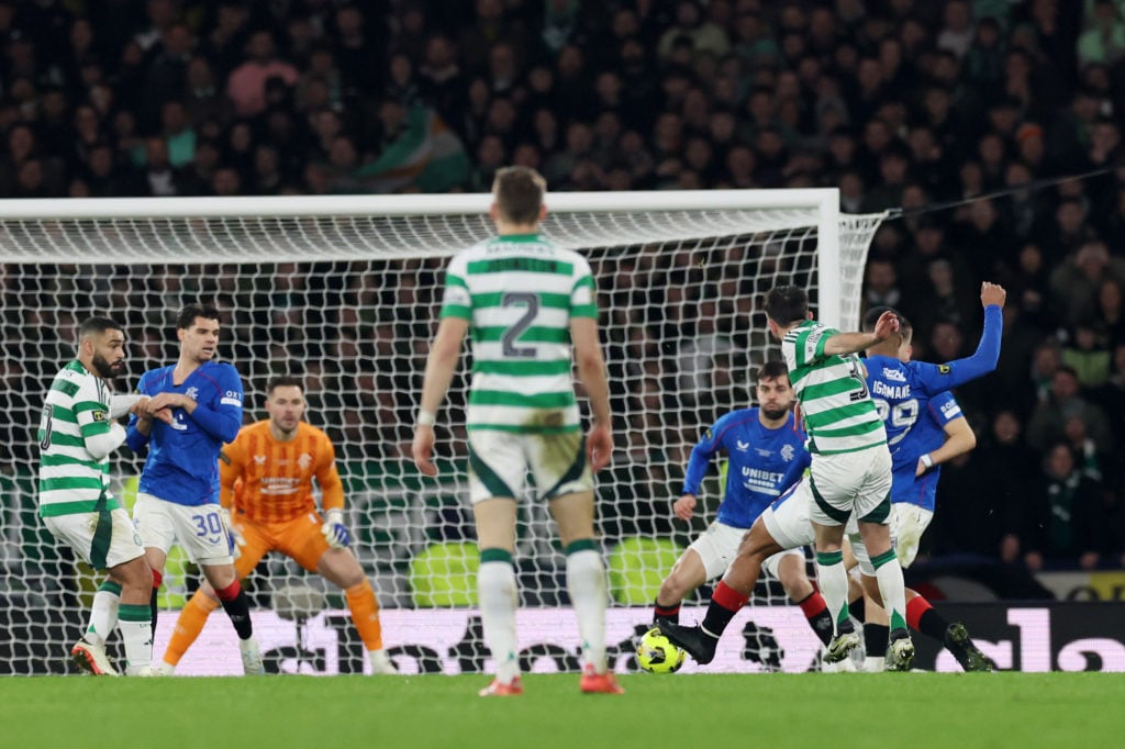 Greg Taylor of Celtic scores his team's first goal during the Premier Sports Cup Final between Celtic and Rangers at Hampden Park on December 15, 2...