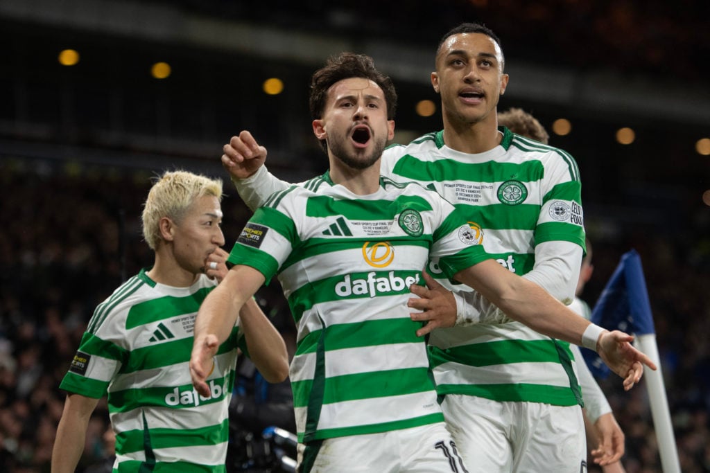 Nicolas Kuehn of Celtic celebrates his side's third goal with teammate Adam Idah during the Premier Sports Cup final between Celtic and Ran...