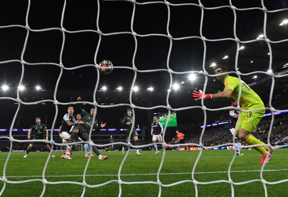 Adam Idah of Celtic scores his team's first goal past Emiliano Martinez of Aston Villa during the UEFA Champions League 2024/25 League Phase MD8 ma...