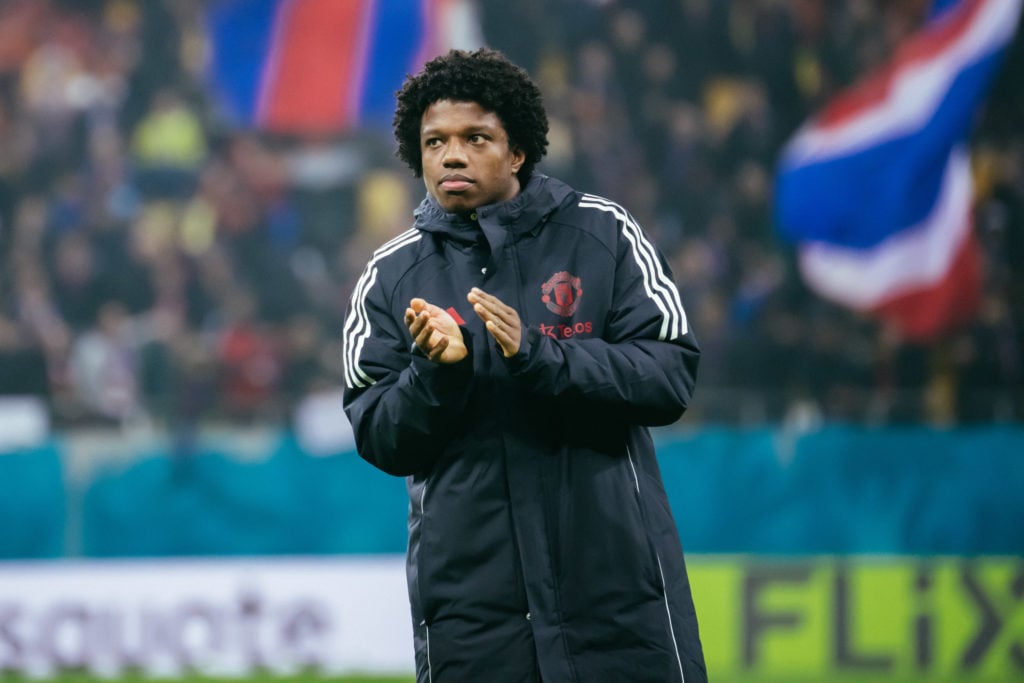 Tyrell Malacia of Manchester United applauds the fans at the end of the UEFA Europa League 2024/25 League Phase MD8 match between Fotbal Club FCSB ...