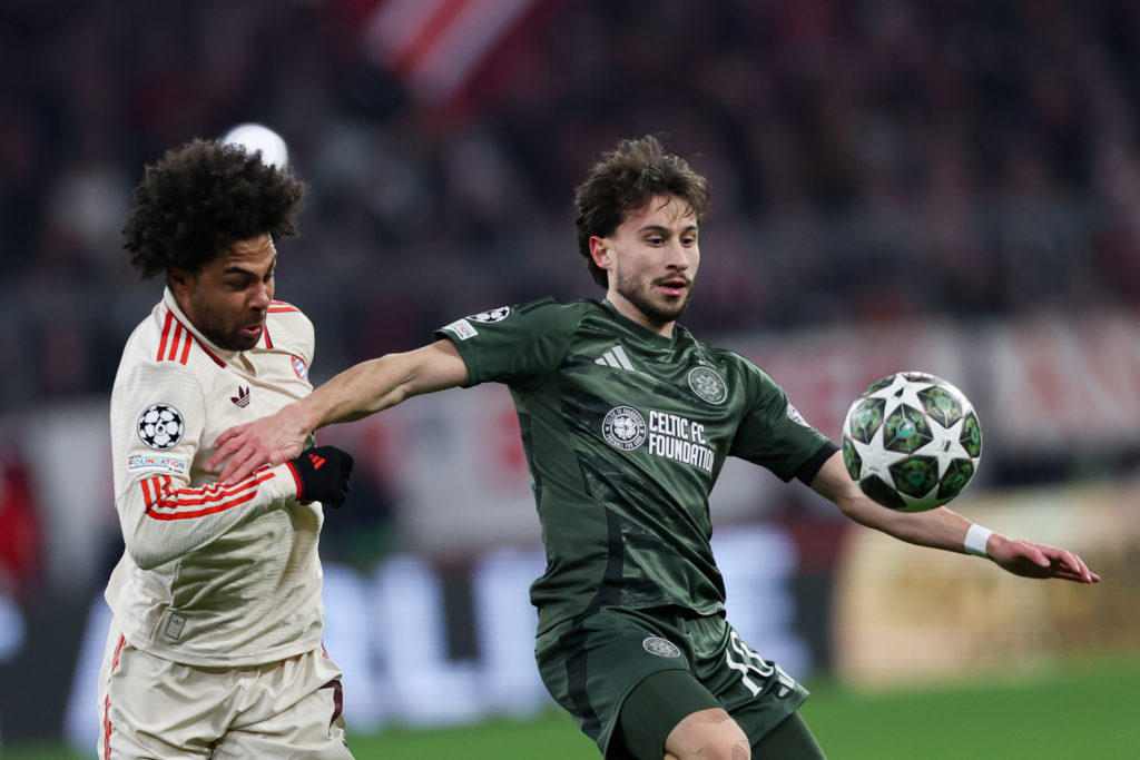 Serge Gnabry of FC Bayern Munich (L) and Nicolas Kuhn of