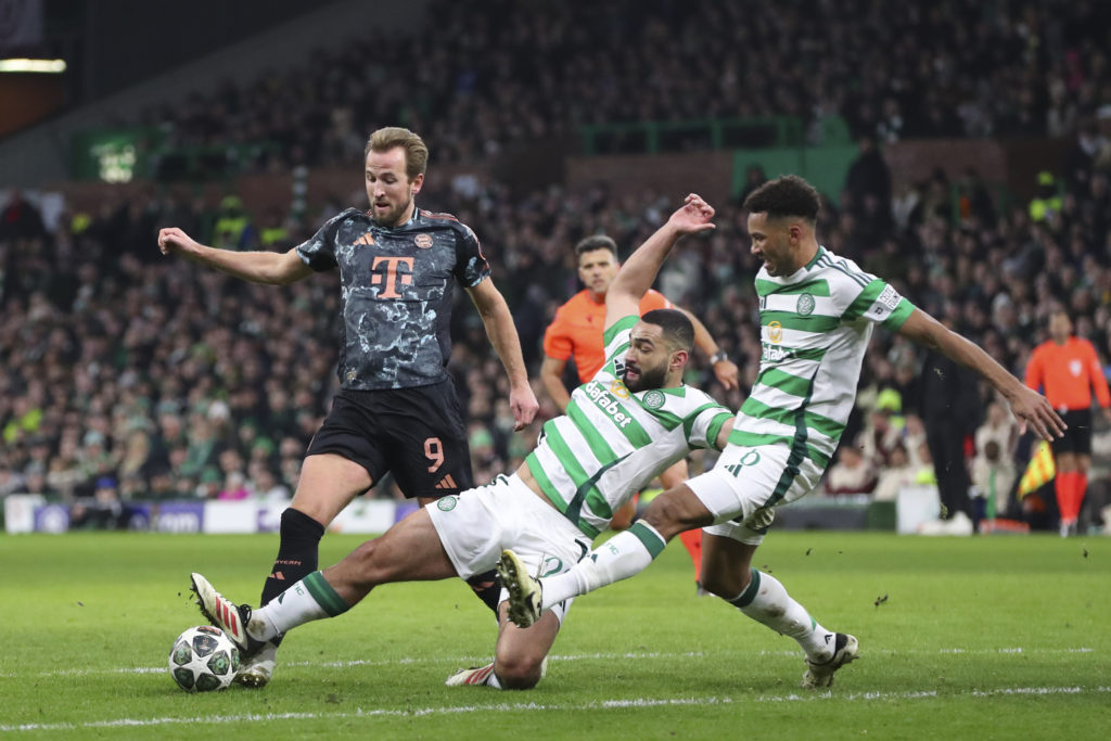 Harry Kane of FC Bayern Munich, Cameron Carter-Vickers of Celtic FC and Auston Trusty of Celtic FC battle for the ball during the UEFA Champions League 2024/25 League Knockout Play-off First Leg match between Celtic FC and FC Bayern Munich at Celtic Park