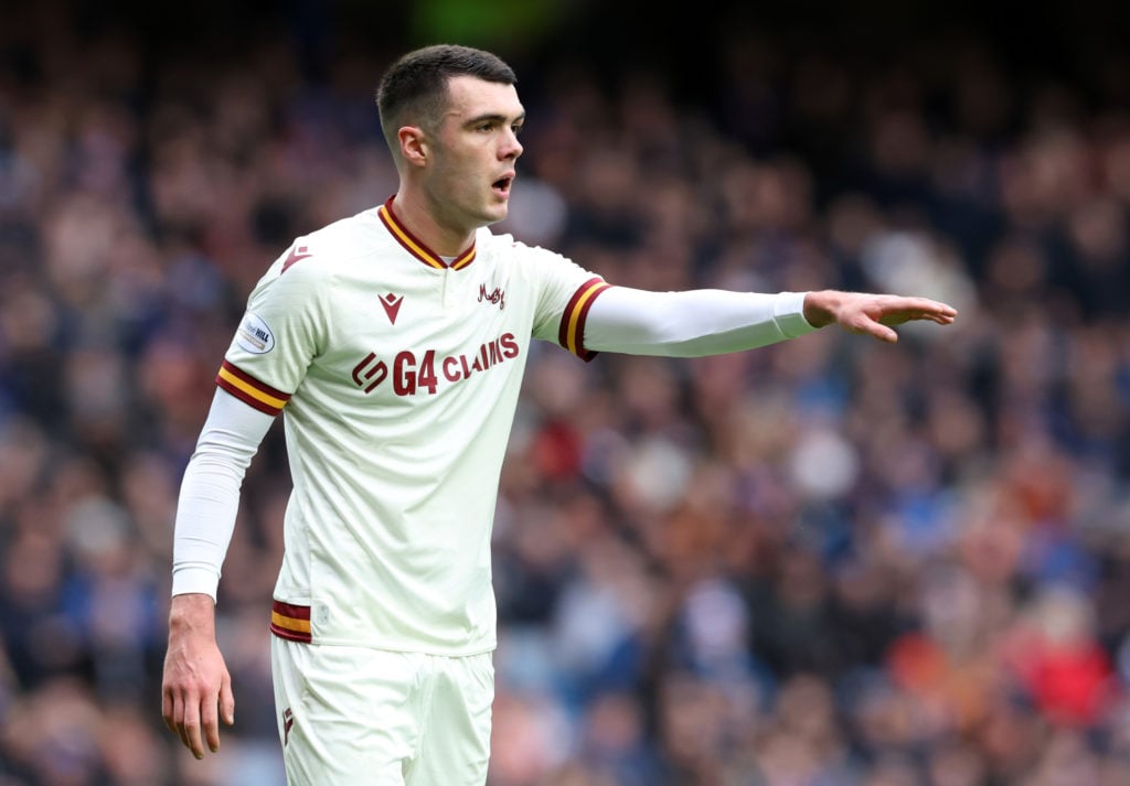 Lennon Miller points to a Motherwell teammate against Rangers
