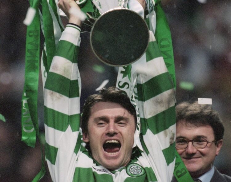 22 Apr 2001: Lubomir Moravcik of Celtic lifts the league trophy up after the Scottish Premier Division match against Hearts played at Celtic Park,...