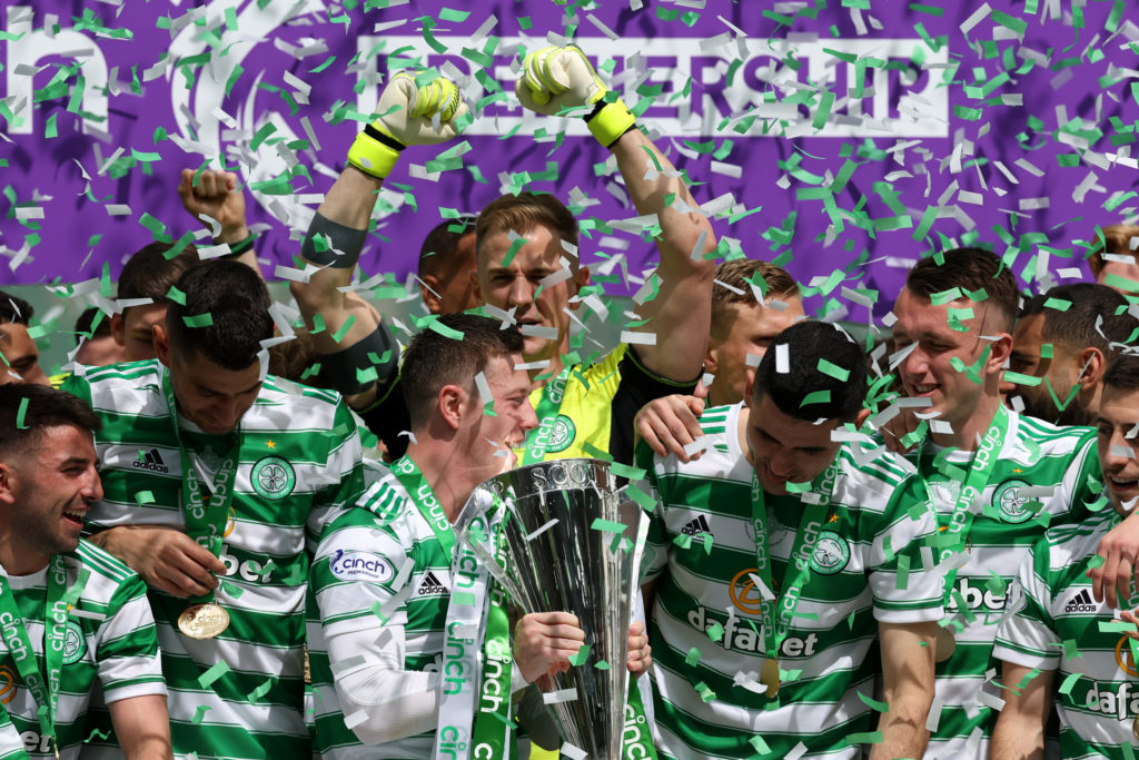 Callum McGregor of Celtic lifts The Cinch Premiership trophy