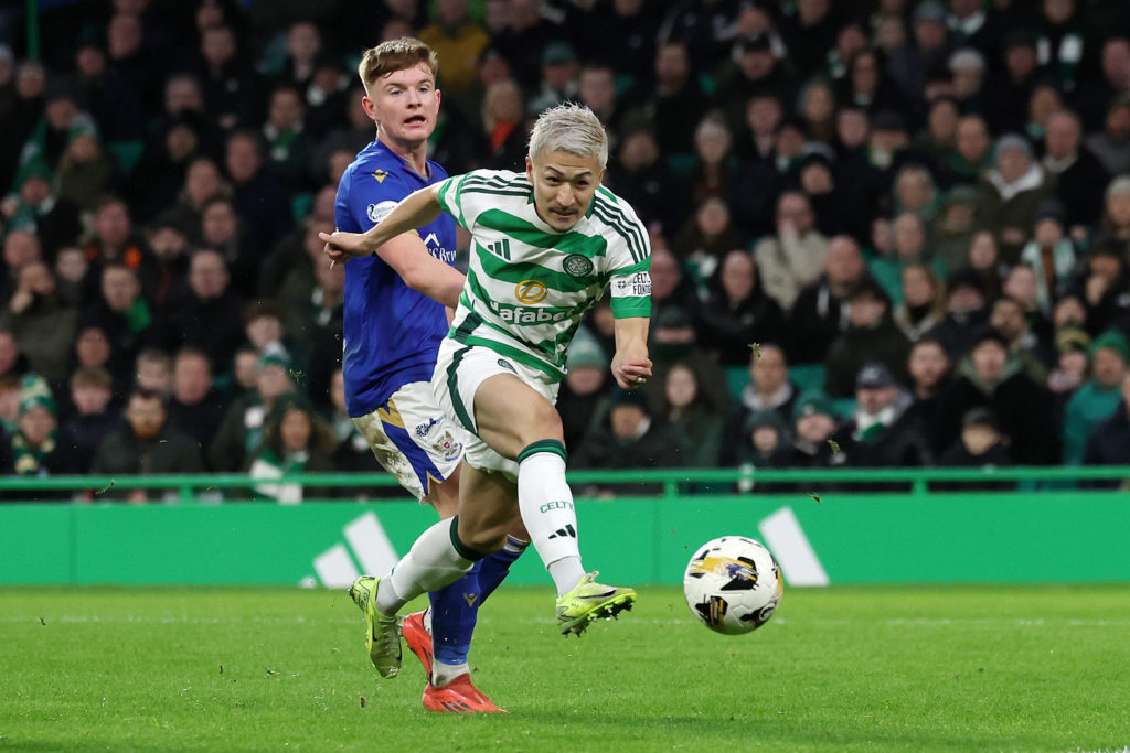 Daizen Maeda of Celtic scores his team's fourth goal during the William Hill Premiership match between Celtic FC and St. Johnstone FC at Celtic Park