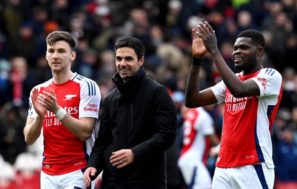 Celtic hero Kieran Tierney applauding the Arsenal fans.