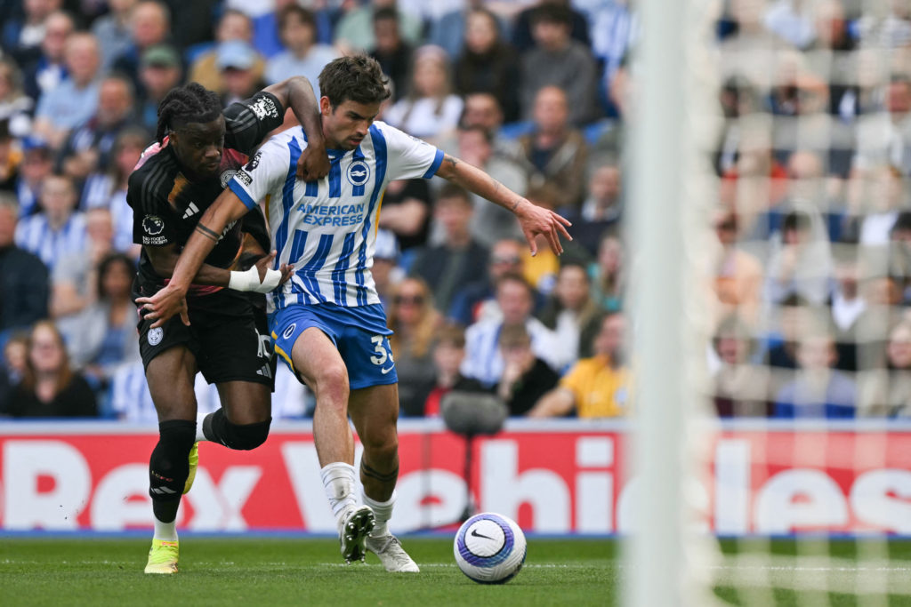 Leicester City's Stephy Mavididi (L) fights for the ball with Brighton's English-born Danish midfielder Matt O'Riley during the English Premier League football match between Brighton and Hove Albion and Leicester City at the American Express Community Stadium