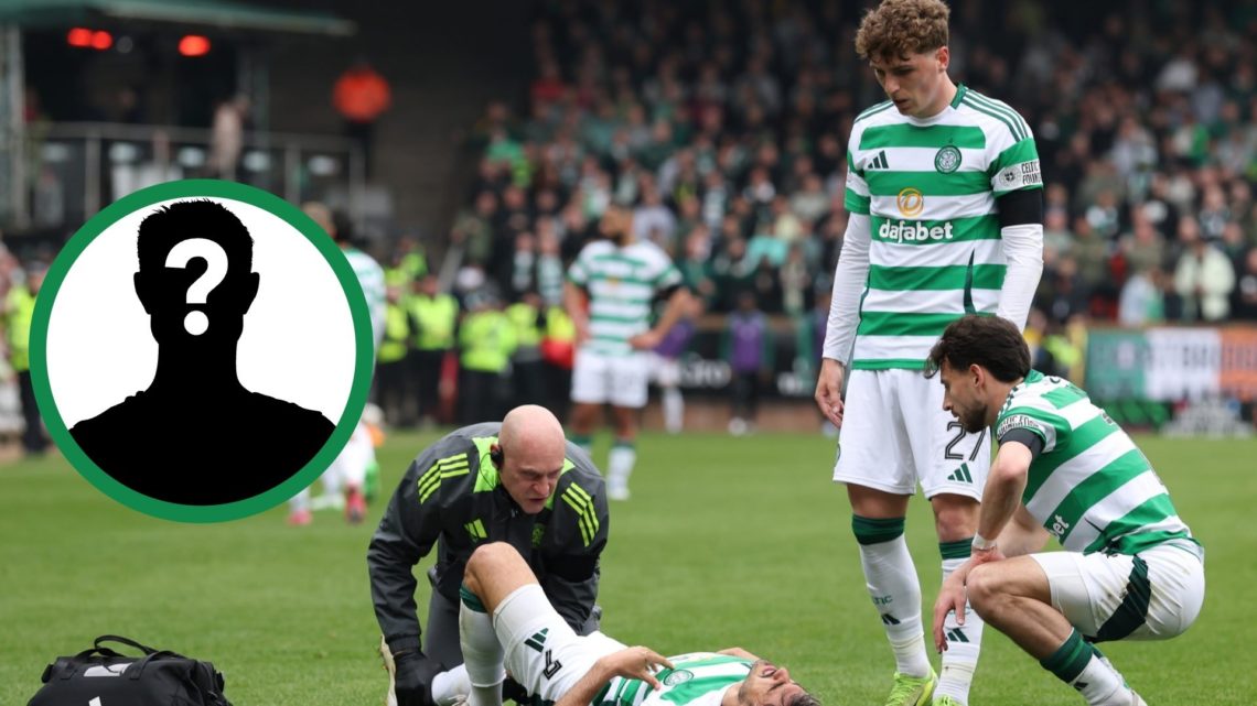 An injured Jota lays on the pitch at Tannadice Park during Celtic's Premiership clash at Dundee United