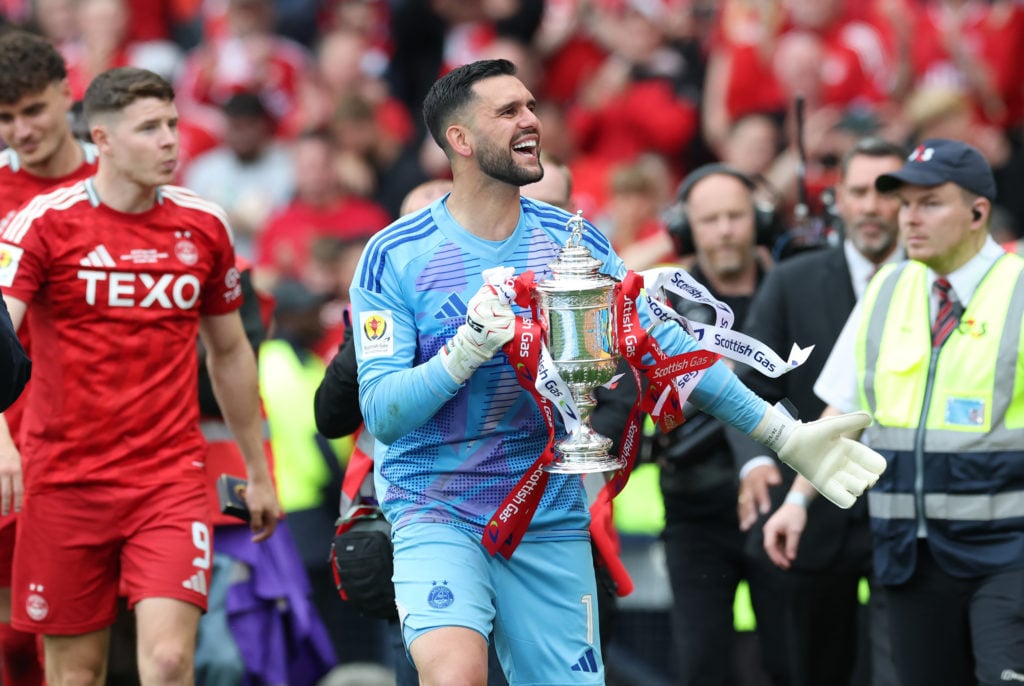 Dimitar Mitov celebrates Aberdeen's Scottish Cup final win over Celtic.