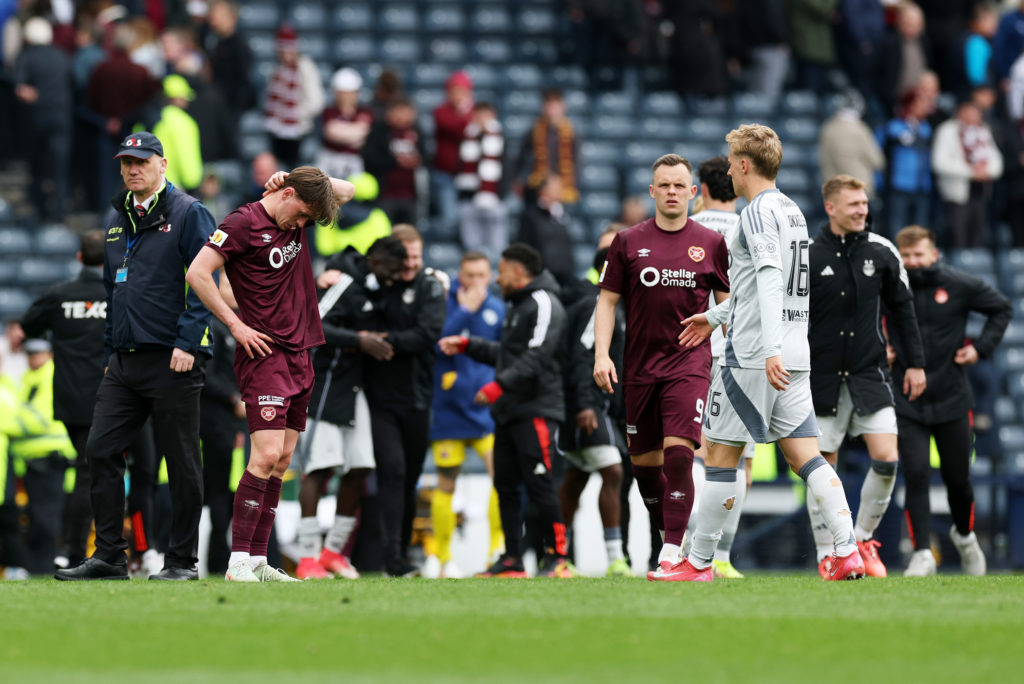 James Penrice of Hearts looks dejected after the team's 2-1 defeat after the Scottish Gas Scottish Cup Semi Final match between Hearts and Aberdeen at Hampden Park