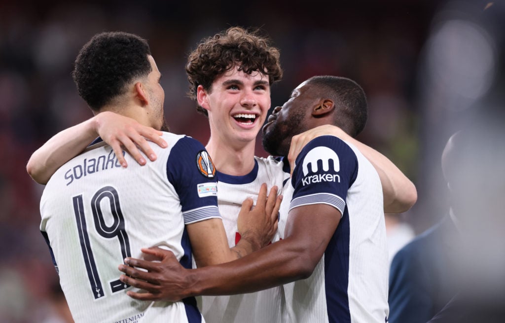 Archie Gray celebrates with teammates after his team's victory in the UEFA Europa League Final 2025 between Tottenham Hotspur and Manchester United at Estadio de San Mames on May 21, 2025
