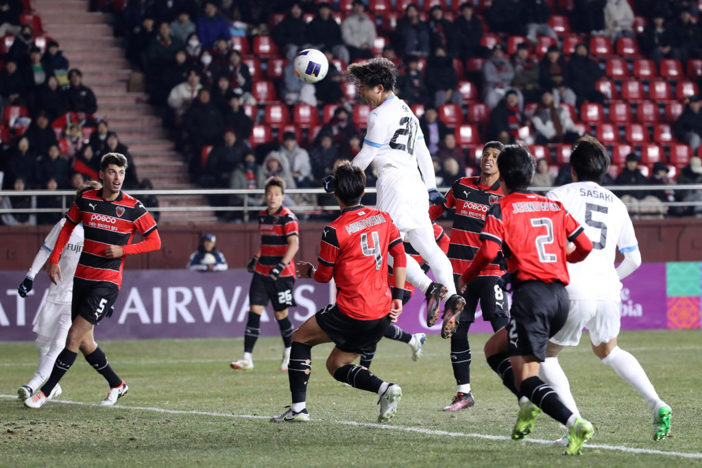 Shin Yamada heads home for Kawasaki Frontale during their AFC Champions League Elite East region match against Pohang Steelers.